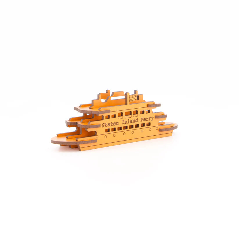 Staten Island Ferry Wood Model —
A flat‑packed wooden model made of thin, smooth pieces with clean edges. Each piece is flat and lightweight, printed in bright orange with no raised texture. When assembled, the pieces slot together to form a simple, rectangular ferry shape with stacked layers suggesting decks. The finished model is small, sturdy, and has no moving parts.