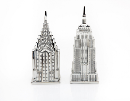 Whimsical, detailed silver-toned salt and pepper shakers that depict The Empire State Building and The Chrysler Building.