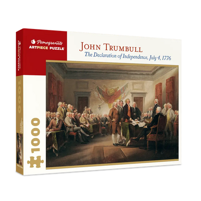 Puzzle box featuring a painting of John Trumbull's 'The Declaration of Independence' with Pomegranate Artpiece Puzzle branding.