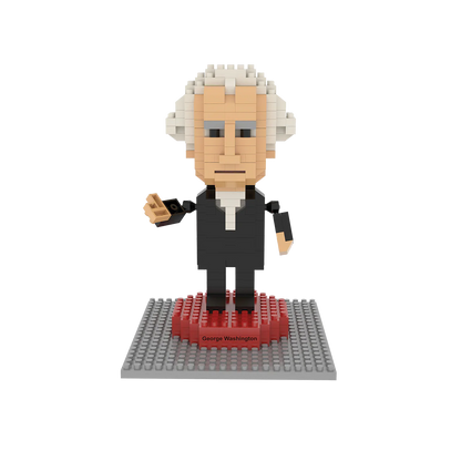 A toy figure of George Washington stands upright on a small base labeled with his name, set against a plain white background. The figure is about 4.5 inches tall and made from tiny interlocking blocks, wearing a long, black 18th-century coat with simple, calm facial features.