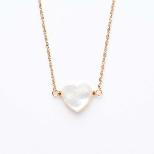 Mother of Pearl Heart Necklace - 
Gold-tone necklace featuring a carved mother-of-pearl heart pendant. The heart has a smooth, luminous surface with subtle iridescent tones and hangs from a textured rope-style chain. The necklace is adjustable from 16 to 18 inches long.