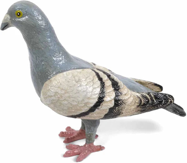 Features a solid cast iron pigeon figurine facing left in profile, hand-painted in soft shades of grayish blue, white, and black, with a lightly distressed finish that gives it a vintage look; each piece is individually hand-finished, so slight variations in color and detailing are to be expected. 