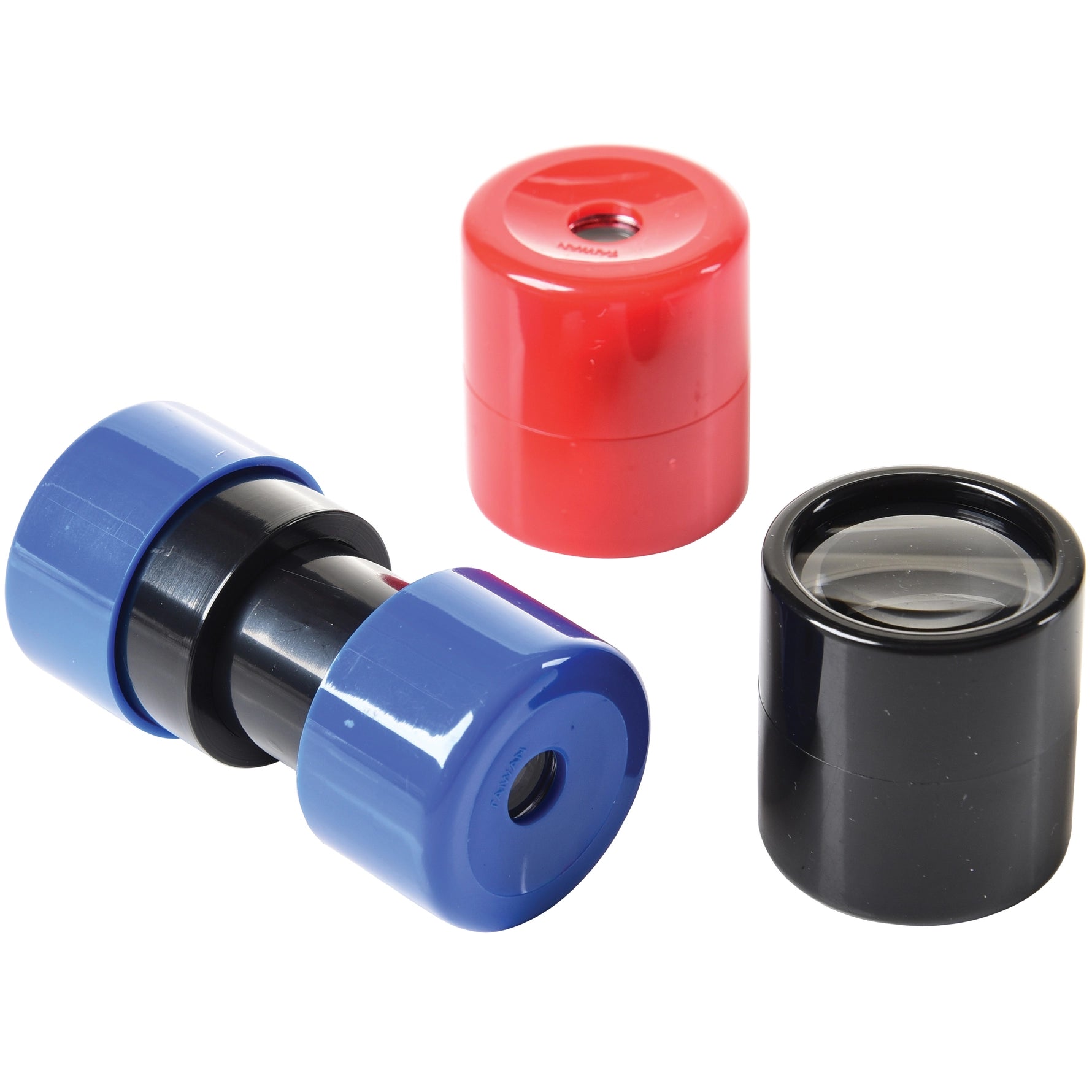 Three small plastic cylinders—one red, one blue, and one black—are shown against a white background. Each cylinder is a tiny handheld telescope that can be pulled open until it reaches about two and a half inches long. When looked through, they enlarge nearby objects up to three times their actual size.