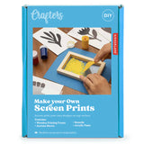 Box with photo of hands using a small screen printing kit on a blue background background.