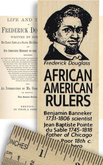A parchment-colored ruler features the names of African American leaders alongside their dates, roles, and achievements, topped with a crosshatched portrait of Frederick Douglass set against text from one of his writings. A second overlapping ruler at the bottom shows standard inch measurements, while the reverse side lists key achievements and life dates; the 12-inch wooden ruler is made from basswood and finished with a clear, non-toxic lacquer.
