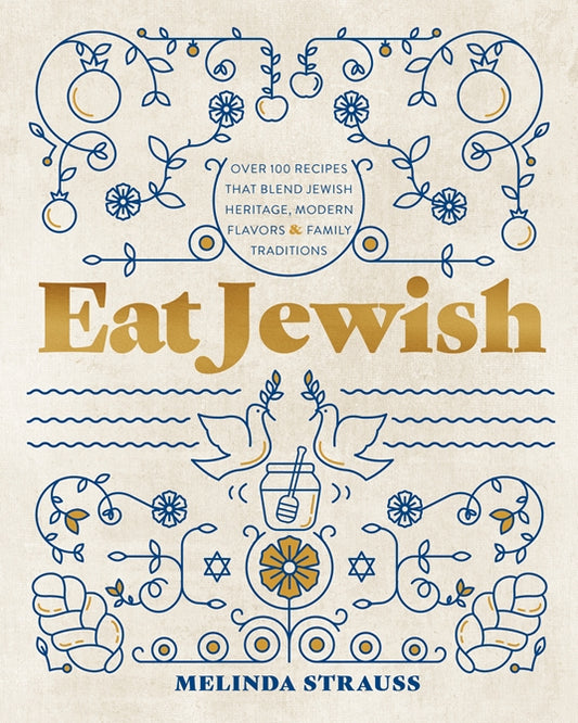 Book title: Eat Jewish. A blue line folk‑art drawing shows apples, doves, a honey jar, and challah bread against a white background. The title appears in the horizontal center of the cover, set in mustard‑yellow lettering.