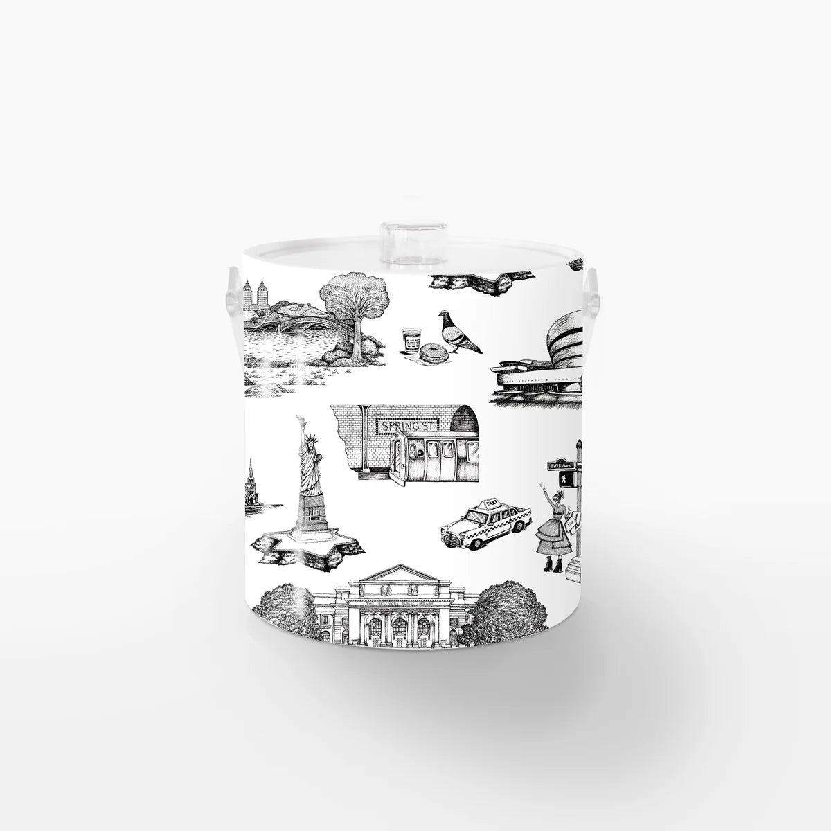 Ice Bucket: New York Toile: The bucket has a white background with a bold black toile pattern showing simple line drawings of NYC icons—pigeons, bagels, Greek coffee cups, and yellow cabs—repeated evenly around the surface. It’s smooth, cylindrical, and topped with a snug lid and a handle in clear Lucite.
