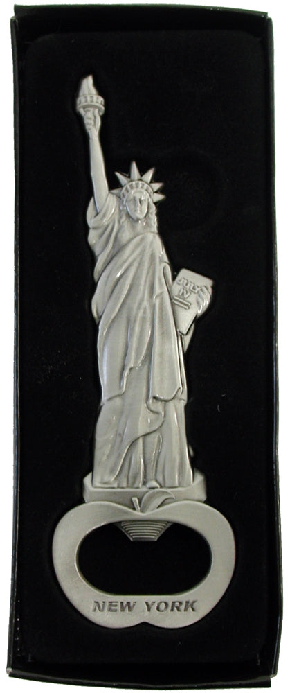 A bottle opener in the replica of the Statue Of Liberty, standing on the Big Apple and signed New York at the bottom of the opener.