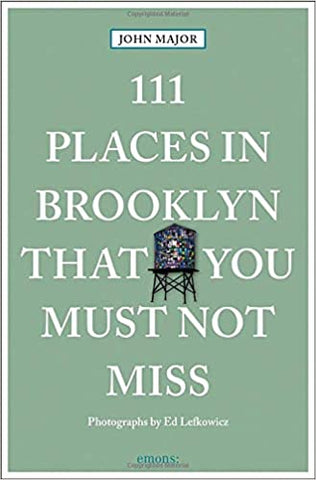 Cover of book titled 111 Places in Brooklyn You Must Not Miss, a green background with a picture of a water tower, title superimposed in white text