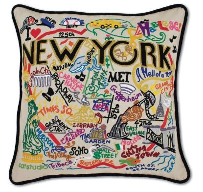 A square pillow with NEW YORK in black lettering surrounded by neighborhoods or locations spelled out with accompanying images. Includes places such as SoHo, Madison Square Garden, Times Square and the Guggenheim, among others, all embroidered in a variety of bright colors. This coordinates with the New York City dish towel.
