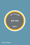 A light blue pamphlet with three concentric circles at the center in white, orange, and gray with text "City Cycling New York".