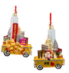 5 inch kurt adler ornament, of santa in a taxi with various new york landmarks adorning the hood