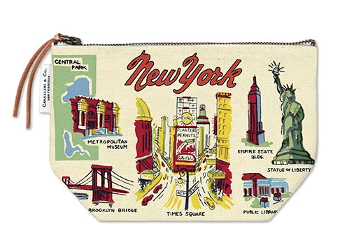 This zippered pouch features vintage style drawings of New York landmarks, including Central Park, the Empire State Building, Times Square, the Statue of Liberty, the Brooklyn Bridge, the New York Public Library, and the Met Museum. The illustrations appear in red, yellow, and blue on a soft, sepia toned background, giving it an old fashioned look. The pouch is made from cotton, lined with fabric, and closes with a zipper and leather pull. It is lightweight and compact, measuring about 6" × 8.75".