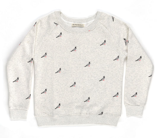 This unisex crew neck sweatshirt is made from soft, breathable fabric and feels smooth and comfortable on the skin. It has a relaxed fit with a round neckline, long sleeves, and gently ribbed cuffs and hem. The surface is covered in a repeating illustration of pigeons in shades of grey, with small pink feet adding contrast, giving the garment a playful, city‑inspired character.