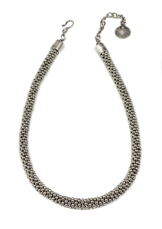 Collar de semillas de peltre