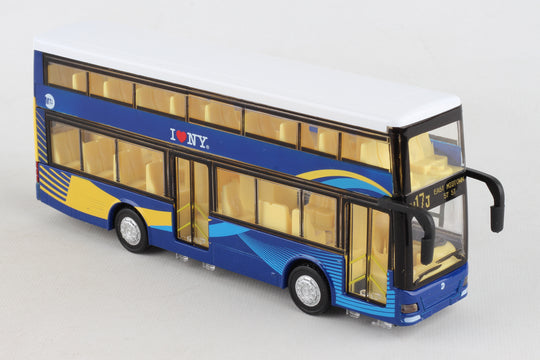 The toy is a small, rectangular double‑decker bus, about the size of an adult hand. It is bright blue with yellow accents, black wheels, and clear windows on both levels that reveal a yellow interior. The shape is boxy, with two stacked rows of windows and doors that open on the side. Small front details suggest working lights, giving it the look of a miniature city bus.