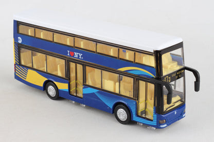 The toy is a small, rectangular double‑decker bus, about the size of an adult hand. It is bright blue with yellow accents, black wheels, and clear windows on both levels that reveal a yellow interior. The shape is boxy, with two stacked rows of windows and doors that open on the side. Small front details suggest working lights, giving it the look of a miniature city bus.