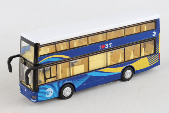 The toy is a small, rectangular double‑decker bus, about the size of an adult hand. It is bright blue with yellow accents, black wheels, and clear windows on both levels that reveal a yellow interior. The shape is boxy, with two stacked rows of windows and doors that open on the side. Small front details suggest working lights, giving it the look of a miniature city bus.