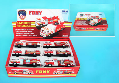 Shows a retail packaging display containing six FDNY fire trucks, arranged for in‑store presentation. An inset image displays the same box with its lid closed, featuring printed images of the product.